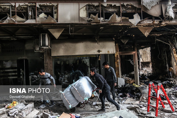 (تصاویر) تخلیه اجناس باقی‌مانده در پلاسکو